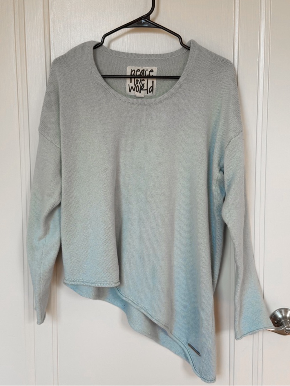 peace love world light blue asymmetrical sweater